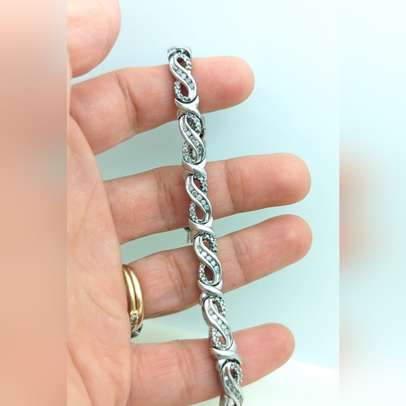 Genuine Diamond and Sterling Infinity Bracelet - Picture 1 of 7
